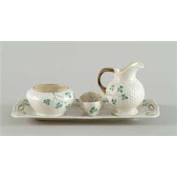FOUR PIECE BELLEEK TABLE SET.