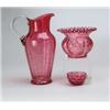 Image 1 : THREE PIECES OF CRANBERRY GLASS.