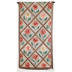 HOOKED FLOWER RUG.