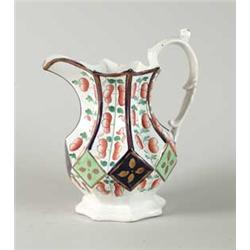 EARLY PITCHER WITH GAUDY TYPE DECORATION.