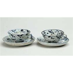 TWO SMALL ORIENTAL CUPS AND SAUCERS.