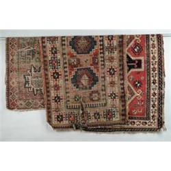 THREE CAUCASIAN ORIENTAL RUGS.