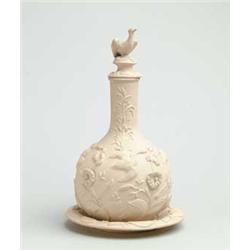 2-PC EARTHENWARE BOTTLE WITH UNDERPLATE.