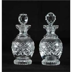 PAIR OF WATERFORD TYPE COLOGNE BOTTLES.