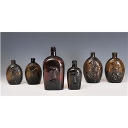 Lot of Four Molded Glass Flasks