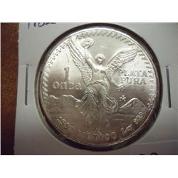 1982 MEXICO SILVER 1 ONZA LIBERTAD MARKER ON OBV.
