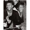 Image 1 : WEEGEE (ARTHUR FEELIG), (American, 1899-1968), AT A CONCERT IN HARLEM, stamped "Credit photo by W...