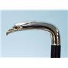 Image 1 : An ebonized mahogany walking stick. Silver handle in form of an eagle's head. With cabochon stone…