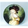 Image 1 : An antique French porcelain wallplate. Handpainted with the portrait of a young lady with a large…