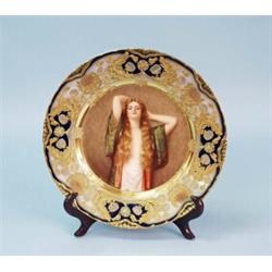 BIEN ETRE. A fine antique "Old Vienna" porcelain wall plate hand painted with the portrait of a y…