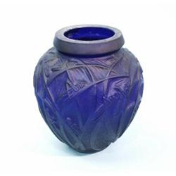 R. LALIQUE, FRANCE. "Sauterelles." An indigo blue art glass vase. 11" high. Unsigned. Illustrated…