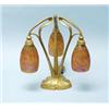 Image 1 : ART NOUVEAU - Daum, Nancy. A fine French gilt bronze table lamp. The triple foliate armed fixture…