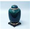 ART DECO - SEVRES. A fine porcelain covered urn of ovoid form. Blue green glaze, plated mounts an…