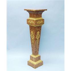An antique French Empire style rouge marble pedestal with revolving top. Decorated with gilt bron…