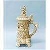 An important 18th century German carved ivory tankard. The large columnar vessel relief carved wi…