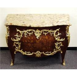 A fine antique French Louis XV style parquetry and marquetry decorated commode. The bombe front w…