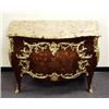 A fine antique French Louis XV style parquetry and marquetry decorated commode. The bombe front w…