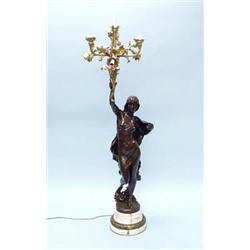 MATHURIN MOREAU (1822-1912) - French school. A pair of superb brown patinated bronze candelabra w…