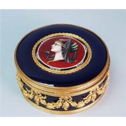 An antique French Limoges porcelain box. Circular cobalt blue enamel case decorated with a centra…