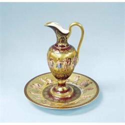 The Four Seasons. A fine antique Old Vienna porcelain ewer with matching plate. The balusted form…