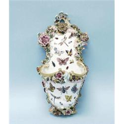 An antique German Meissen porcelain wall hanger. The slipper shaped vessel handpainted with colou…