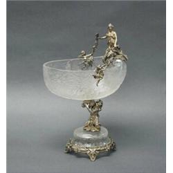 An important antique Austrian rock crystal and silver bowl. The oval crystal vessel relief carved…
