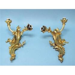 A fine pair of antique French three-light gilt bronze wall sconces in the Louis XVI style. Wired …