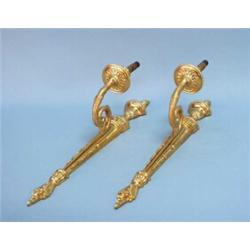 A pair of antique French Louis XVI style gilt bronze wall sconces. Wired for electricity. Approx.…