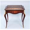 A good marquetry decorated mahagony covered jardiniere. The rectangular top with metal inset. Lid…