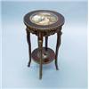 A very good antique French two tier occasional table with hand painted Sevres porcelain inlays an…
