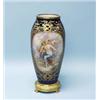 A fine antique French gilt bronze mounted Sevres porcelain vase. The oviform body hand painted on…