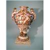 A monumental antique Italian Capo-Di-Monte vase. The baluster form body hand painted and relief d…