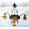 MULLER FRES. - LUNEVILLE. An unusual art glass chandelier. The basket shaped central fixture set …