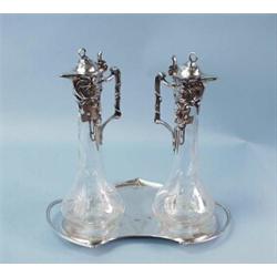 ART NOUVEAU - W.M.F. A pair of very good etched glass decanters with silver plated mounts and com…