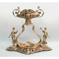 ART NOUVEAU - A magnificent turn of the century W.M.F. silver patinated figural centrepiece. The …