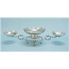 Image 1 : An English sterling silver centrepiece in form of a wirework stand supporting three facetted bowl…