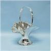 An unusual turn of the 20th century English sterling silver fruit basket. The oval shaped facette…