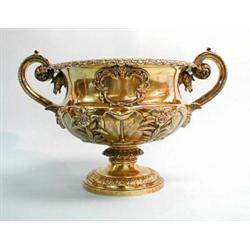 An important Georgian gilt silver urn with twin scroll handles. Exceptional workmanship, marked f…
