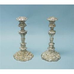 A pair of exceptional antique English sterling silver candle sticks. Each 12 1/2" high. Fully mar…
