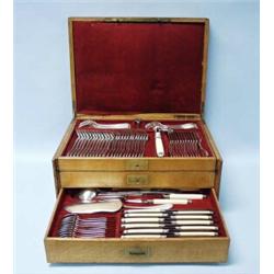An antique French 129 piece sterling silver cutlery set with ivory handles, comprising 12 of each…
