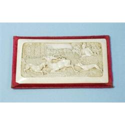 Dogs Attacking a Wounded Stag. A finely carved antique French miniature ivory plaque. Relief carv…
