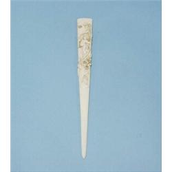 A well carved antique French ivory letter opener. Relief carved with a naked putto catching butte…