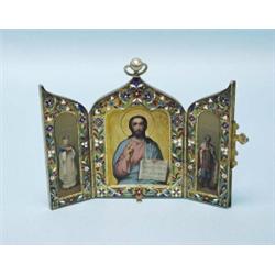 An important antique Russian silver travelling triptych. The vermeil panels handpainted with icon…