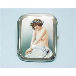 A heavy Austrian enamelled silver cigarette box. Cover handpainted with a semi-nude young girl, f…