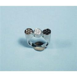 An 18 kt. white gold and diamond cocktail ring of modernist design. Three adjoining circles set w…