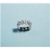 Image 1 : An unusual 18 kt. white gold and diamond band ring. Set with 13 round brilliant cut diamonds in t…