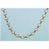 An 18 kt. yellow gold and diamond necklace. Designed of small enamelled floral segments interspac…
