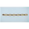 An exquisitely handmade 18 kt. yellow gold and diamond bracelet designed of six oval medallions, …