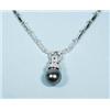 An 18 kt. white gold and diamond necklace with a removable diamond set Tahitian pearl, 12mm, gem …