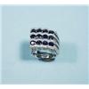 An unusual 18 kt. white gold, diamond and sapphire cocktail ring of geometric design. Set with th…
